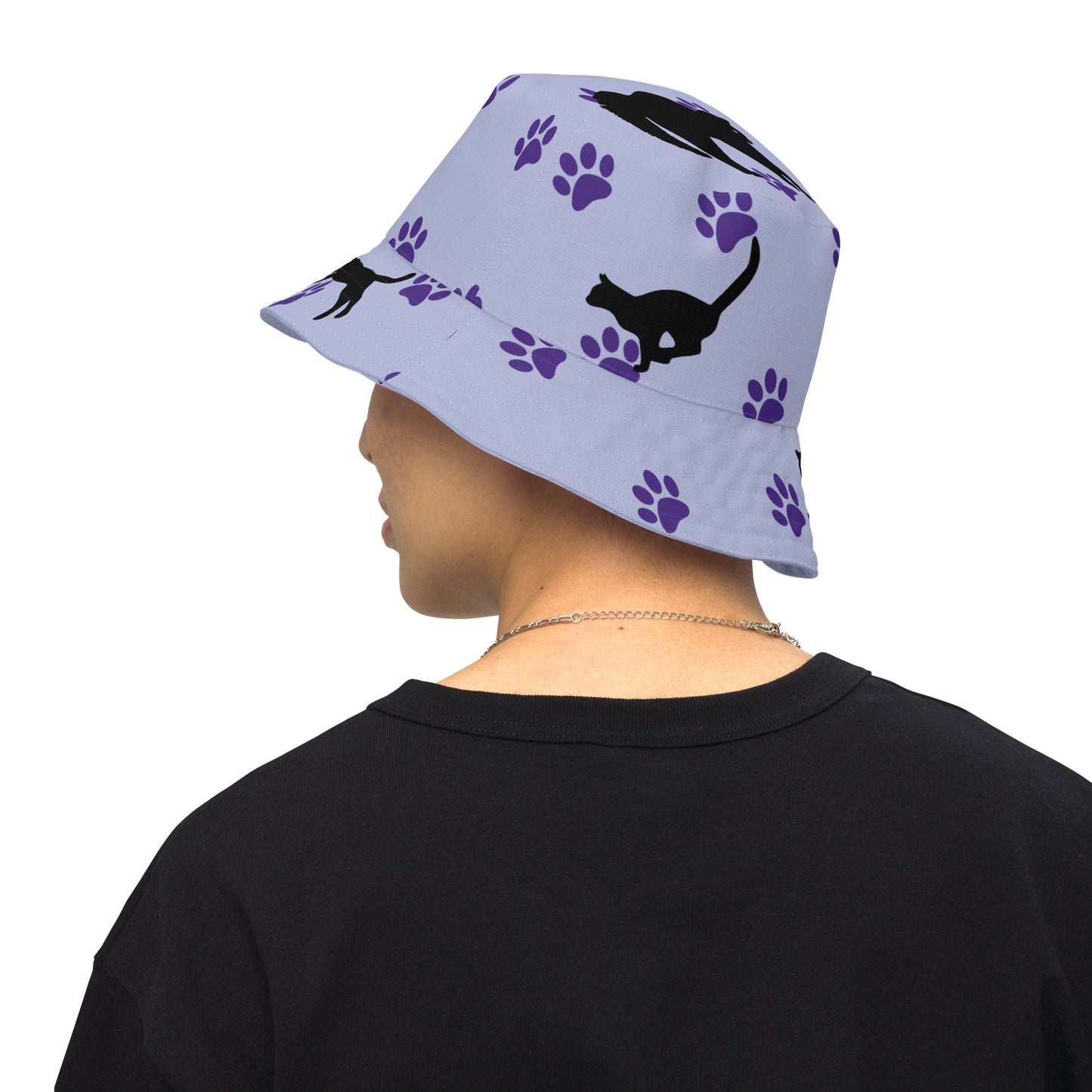 Reversible bucket hat - Cat Run - Black cat with Purple paw Prints on light purple hat