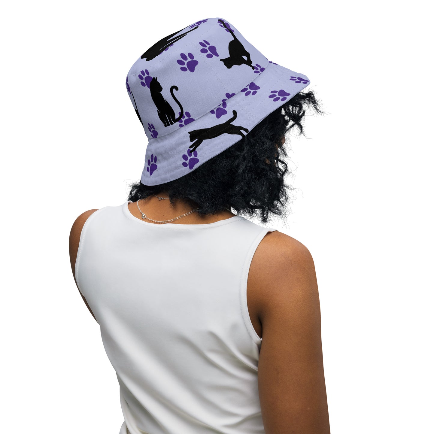 Reversible bucket hat - Cat Run - Black cat with Purple paw Prints on light purple hat