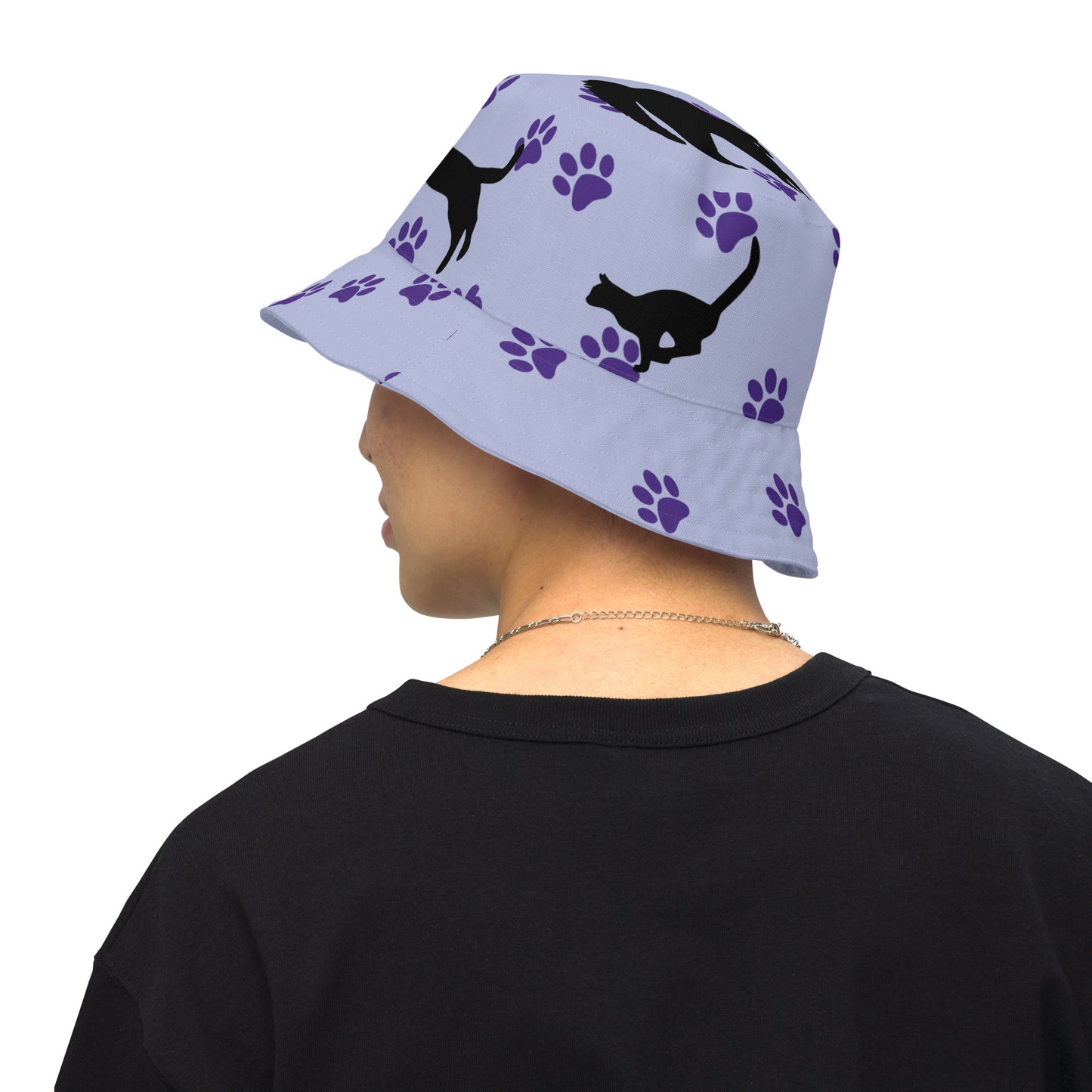 Reversible bucket hat - Cat Run - Black cat with Purple paw Prints on light purple hat