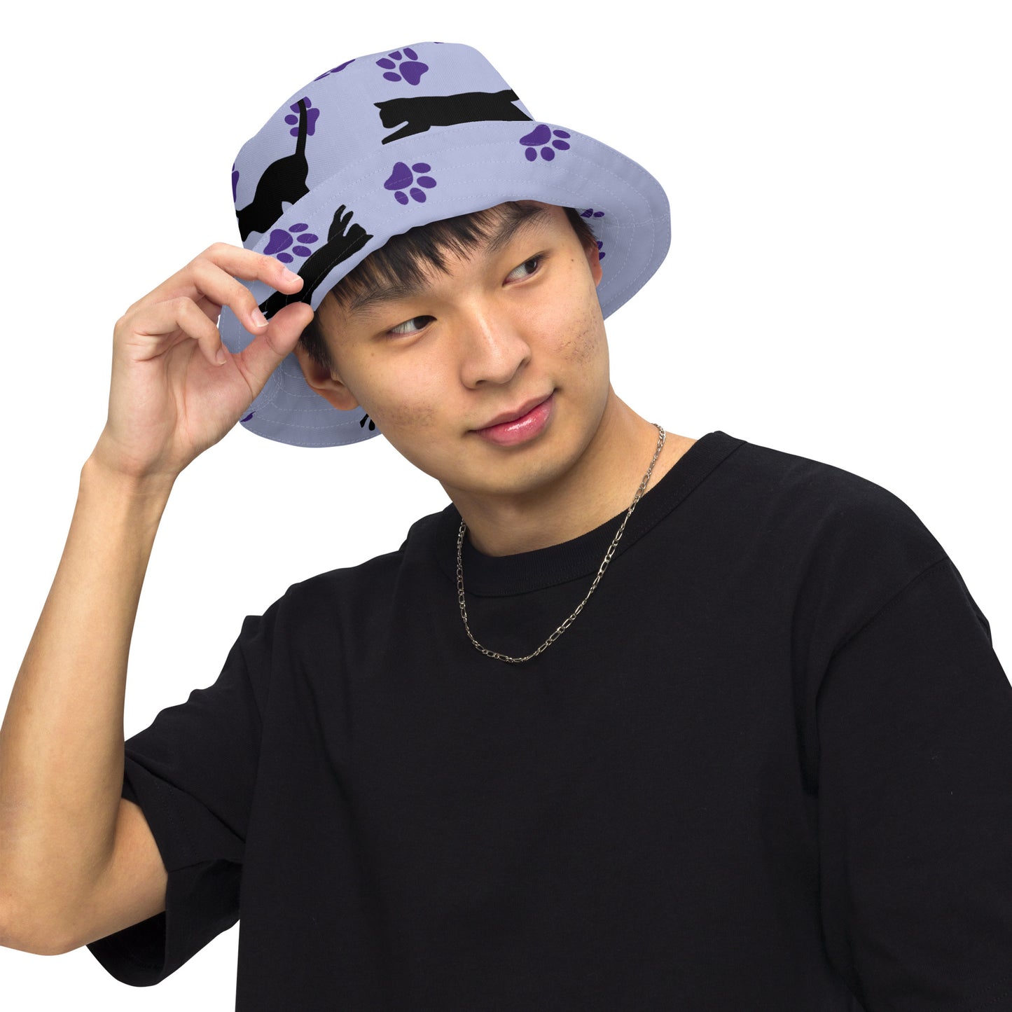 Reversible bucket hat - Cat Run - Black cat with Purple paw Prints on light purple hat