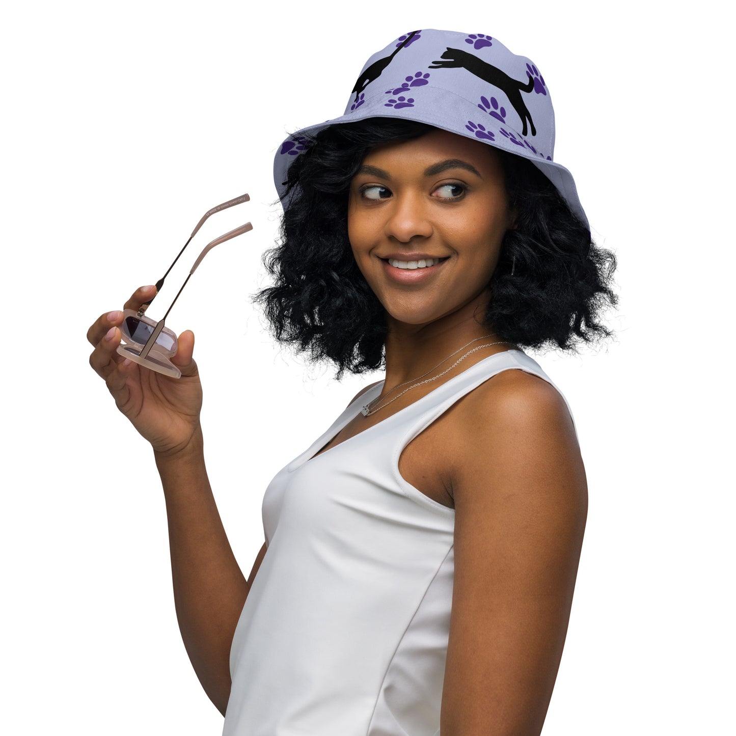 Reversible bucket hat - Cat Run - Black cat with Purple paw Prints on light purple hat