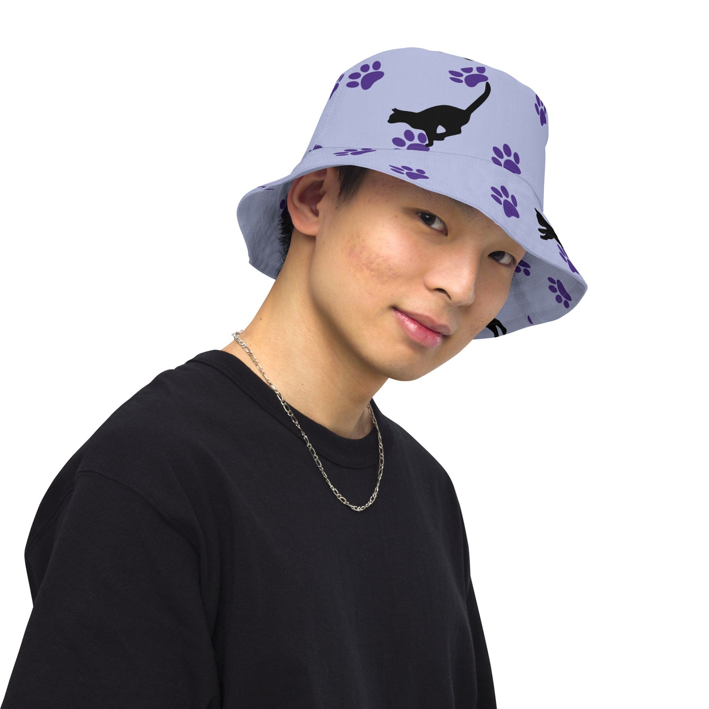 Reversible bucket hat - Cat Run - Black cat with Purple paw Prints on light purple hat