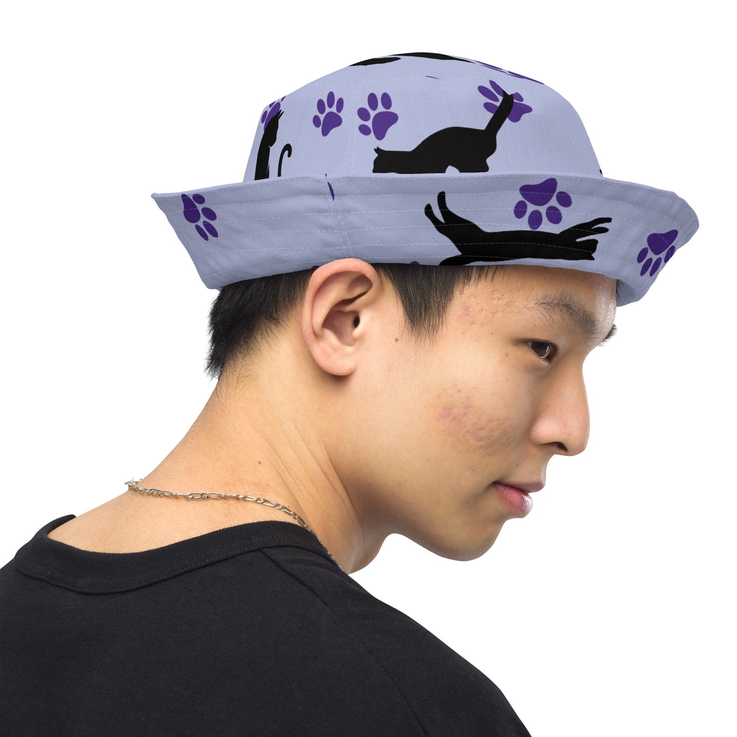 Reversible bucket hat - Cat Run - Black cat with Purple paw Prints on light purple hat